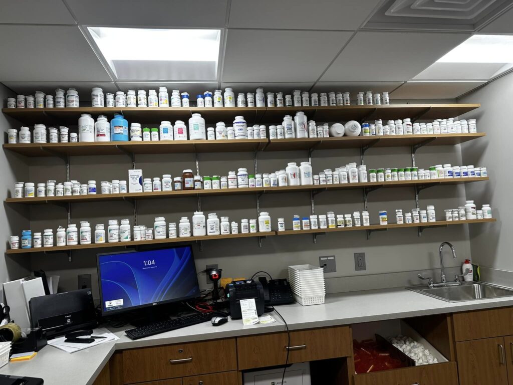 An image showcasing the drug filling space at Kentucky Pharmacy, featuring the advanced Pioneer drug filling system.